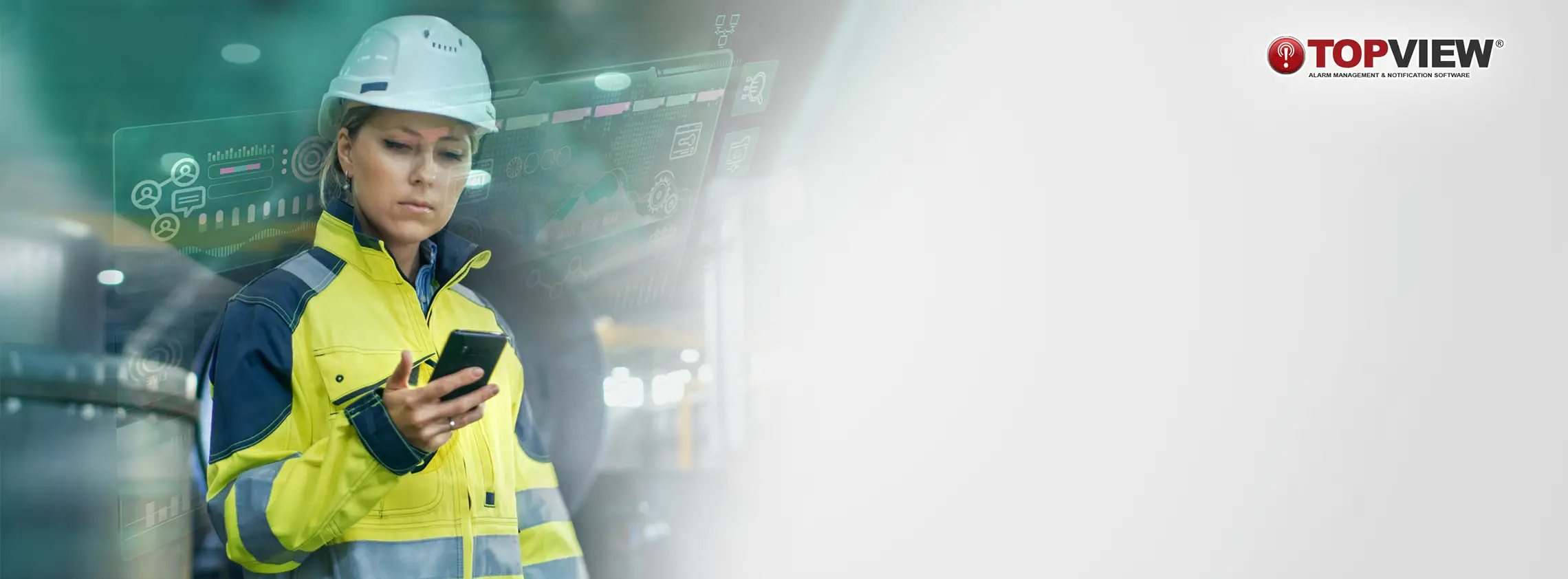 Female Engineer using TopView alarm management and notification software to monitor industrial processes and system performance.